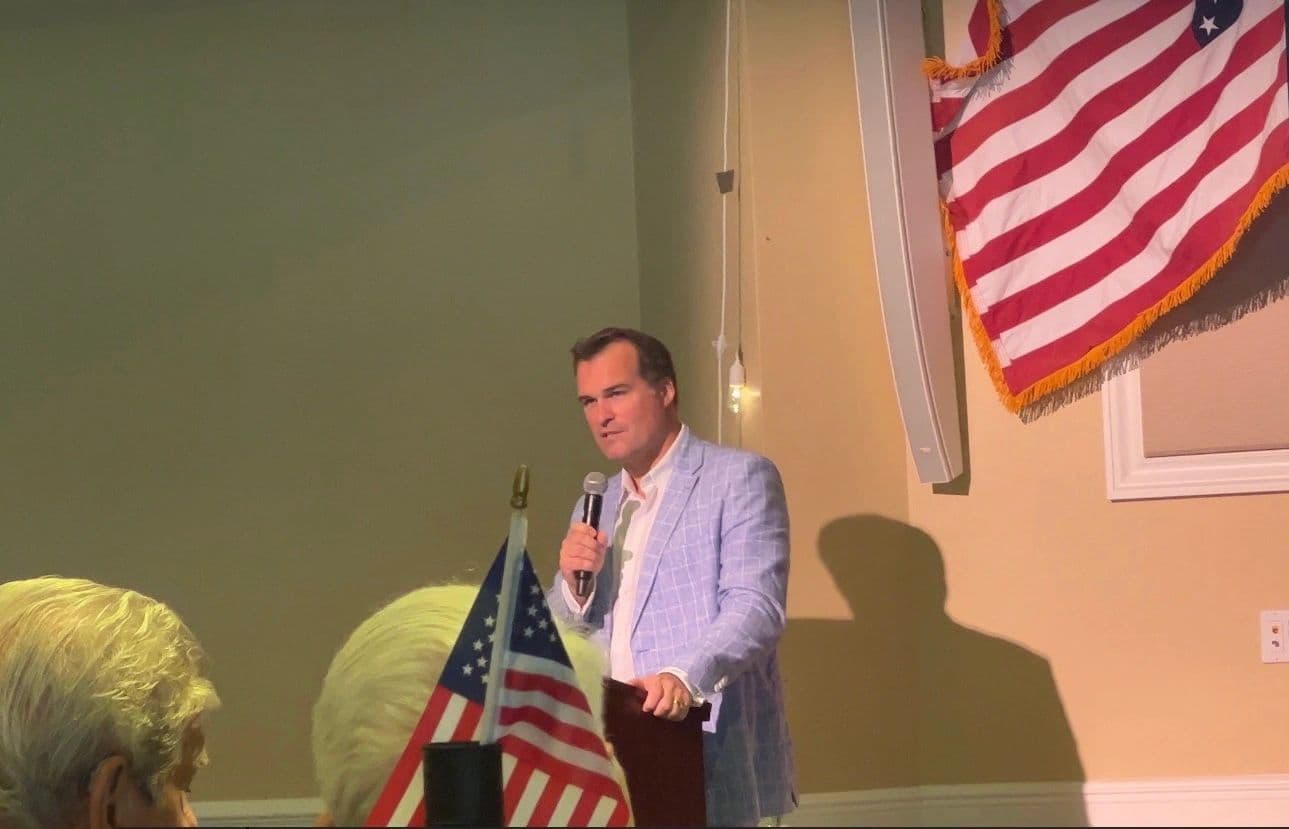 Alex speaking at a campaign event
